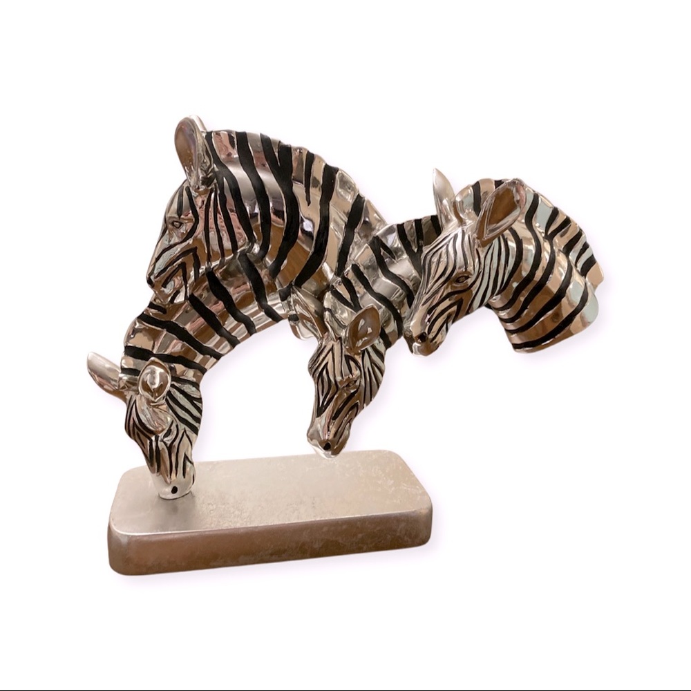 Grazing zebra metallic resin statue